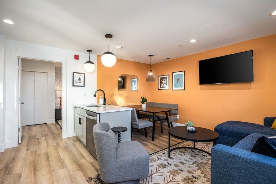 Gather for a meal around the dining table with seating for 6.