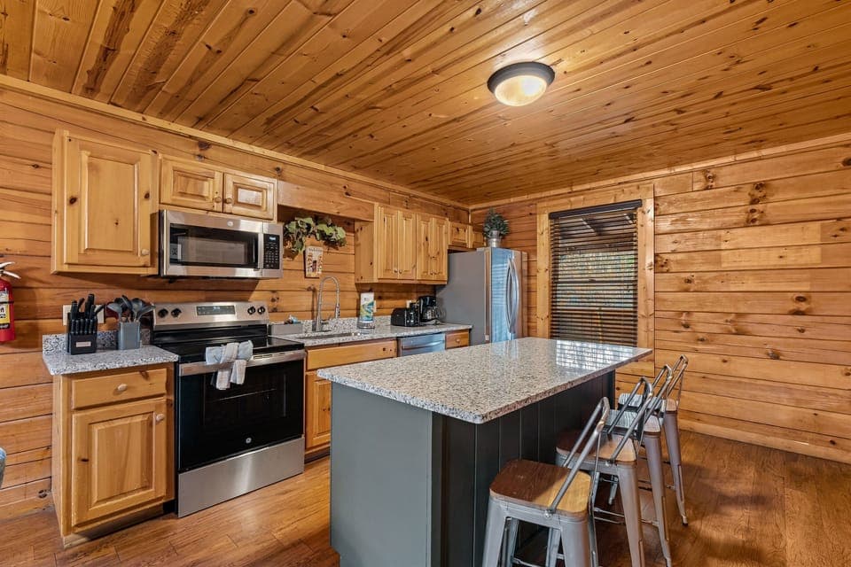 Fully loaded Kitchen with granite countertop and stainless steel appliances 