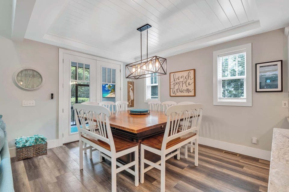 Experience memorable meals in the elegant dining area, where the generous table provides the ideal backdrop for family dinners and festive celebrations. With room for 10 to 12, this space fosters connection and conversation, making it perfect for you