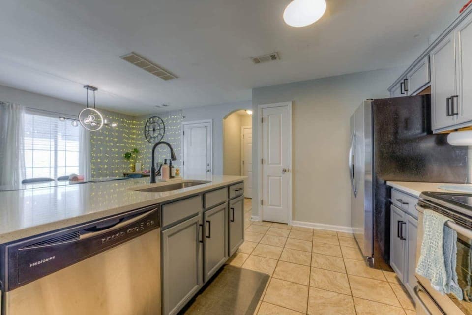 Kitchen looking into coffee bar