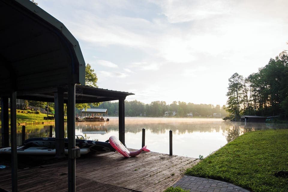 All your cares will melt away by the dock overlooking this serene lake.