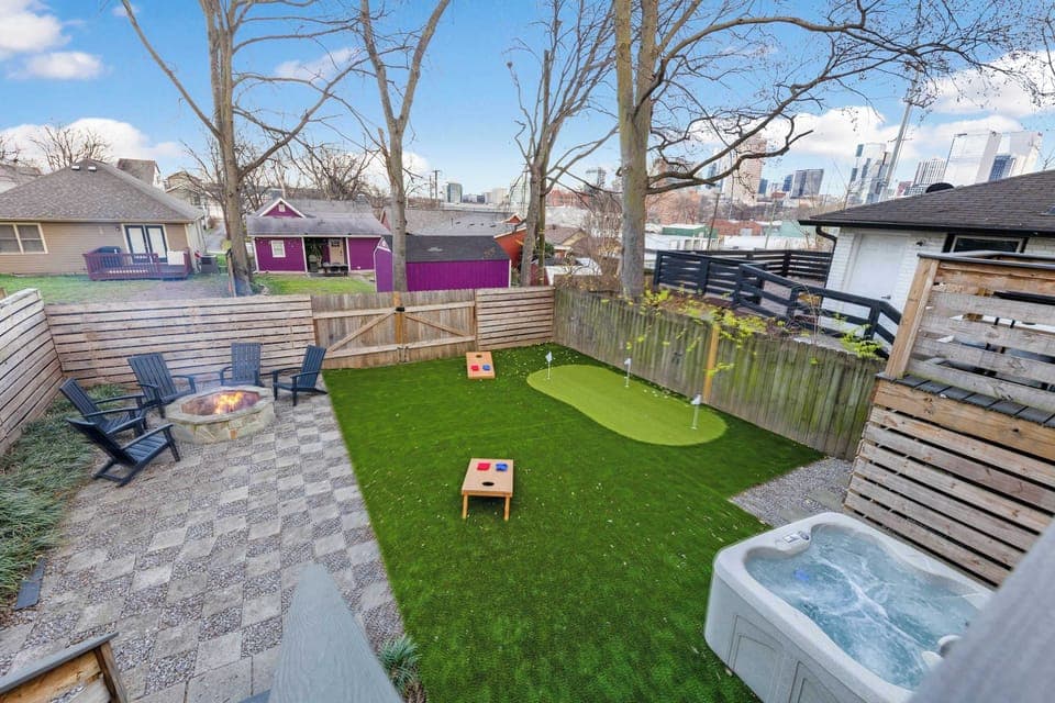 Relaxation Awaits in This Peaceful Outdoor Escape with a Hot Tub and a Fire Pit