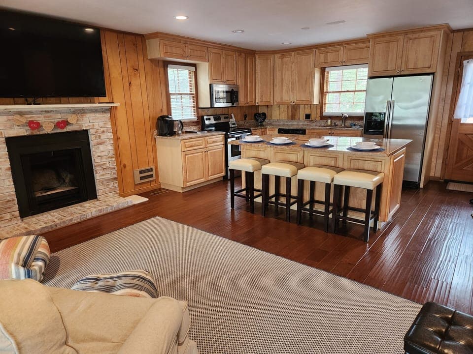 Open kitchen and family room for all to gather 