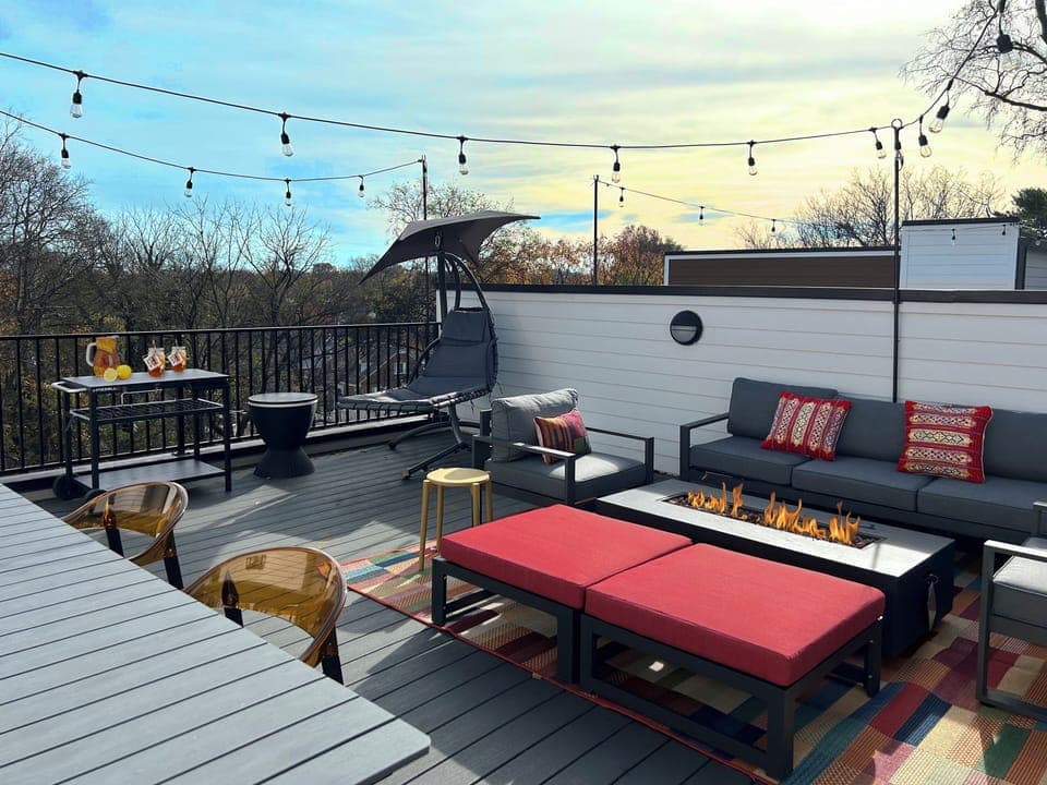 Everything you need is here, resort-style lounge seating, fire table, bar cart…