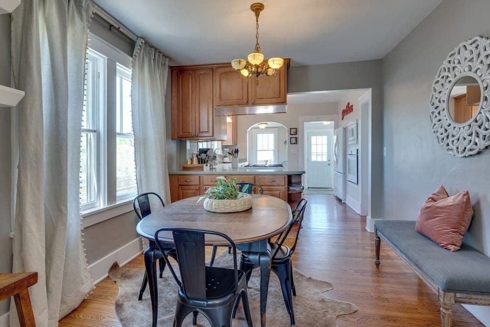 Pull the bench up and there is seating for 6 as well as a table for two in the breakfast nook. 