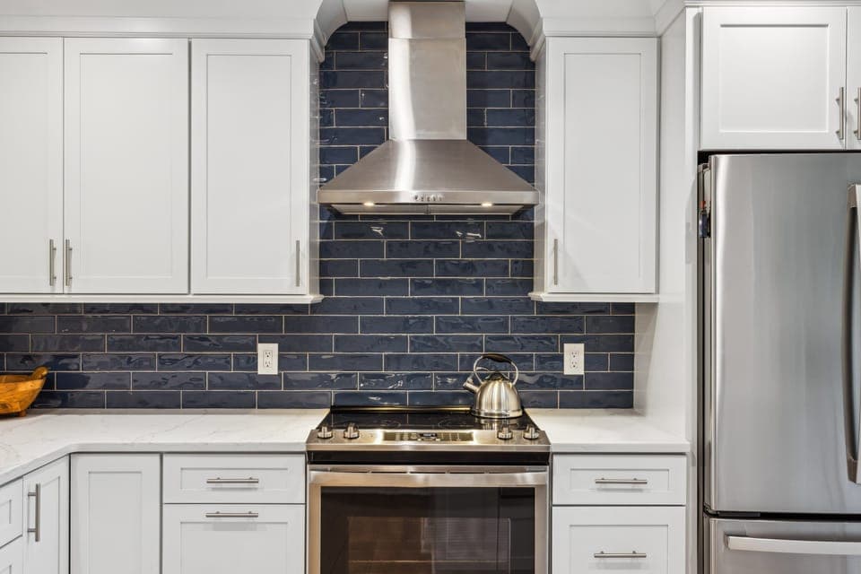 Fully stocked kitchen with stainless steel appliances