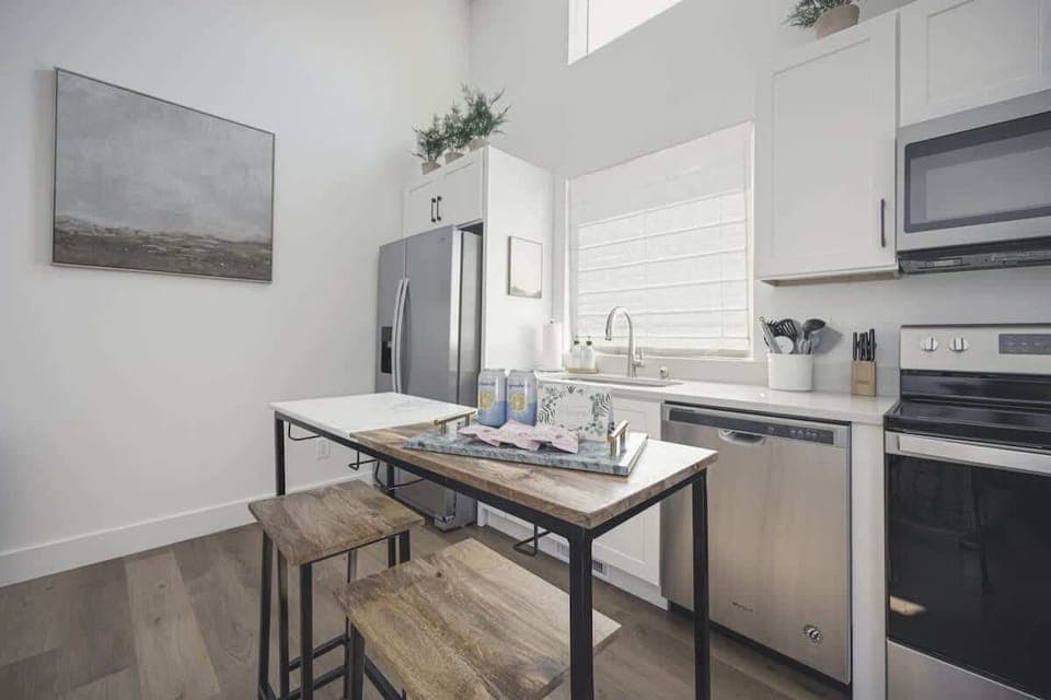 Beautifully appointed kitchen with island for additional seating and counter space.