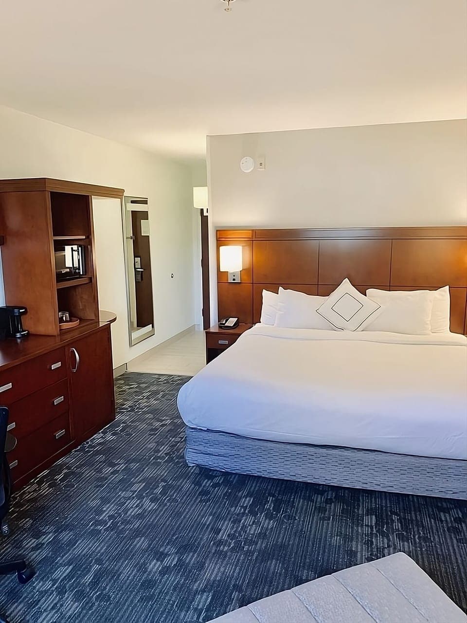 Settle into a spacious king room with convenient built-ins.
