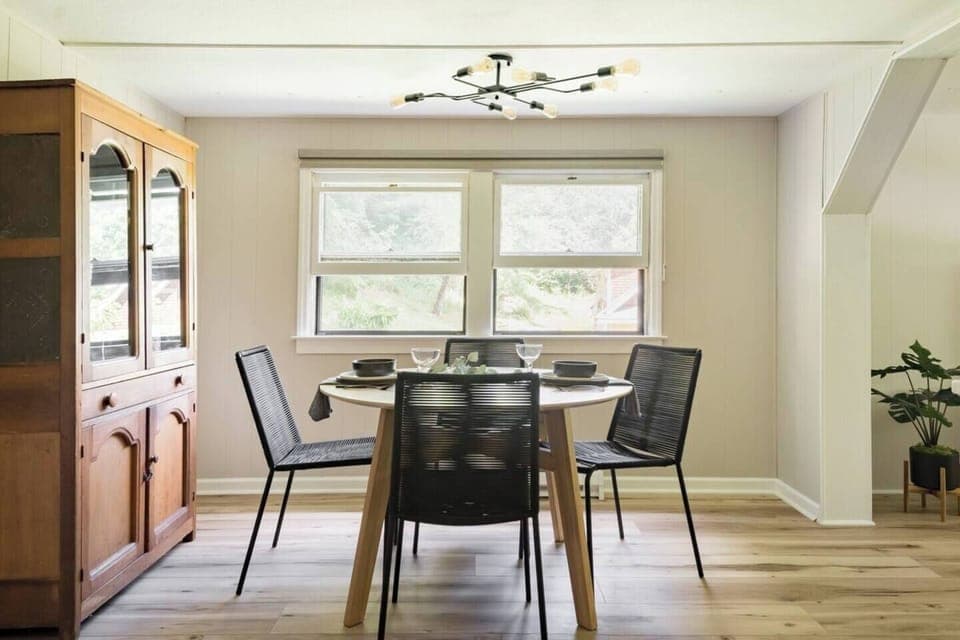Our circular kitchen table seats four, and we have additional chairs to seat up to six people.