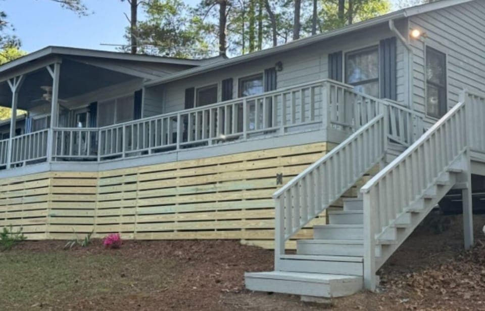Huge deck that is partly covered for your comfort. 