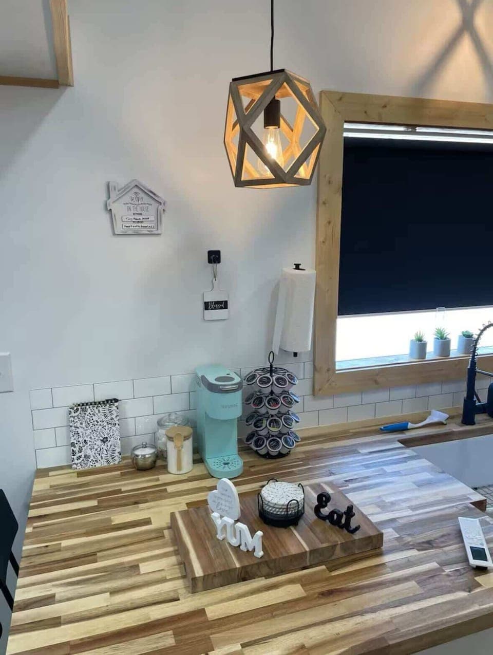 Charming Kitchen: Modern design meets rustic accents for delightful meal prep moments!