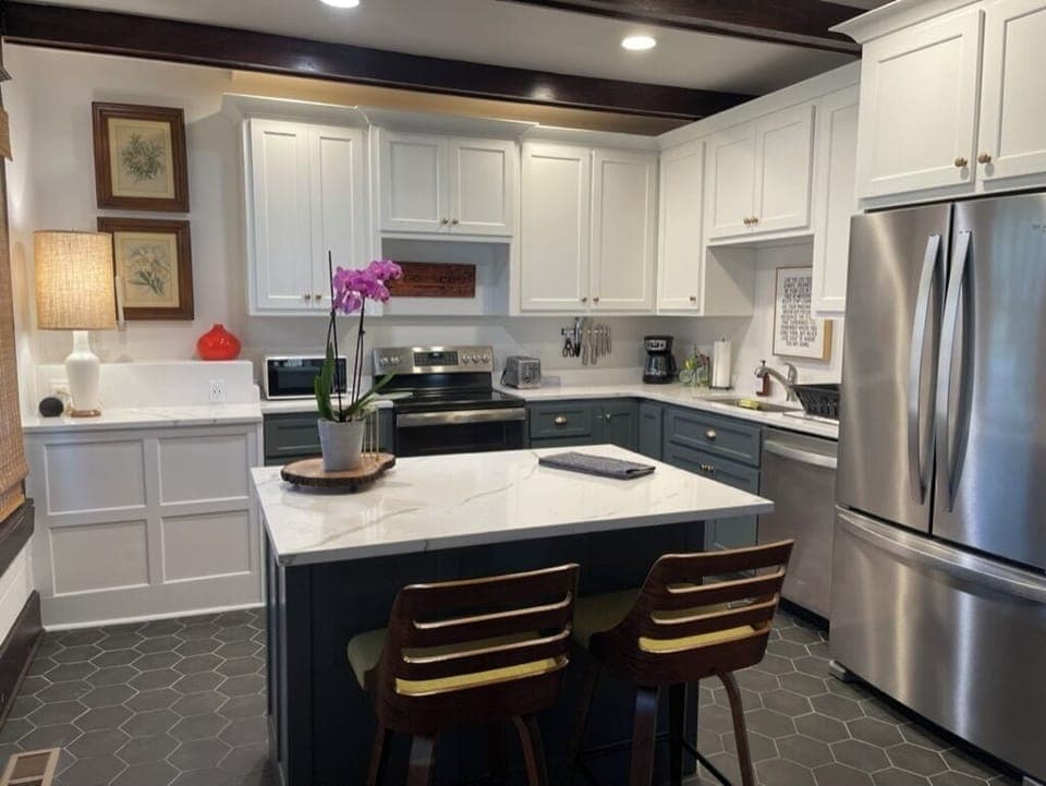 Kitchen with island full amenities included to cook meals for family & friends.
