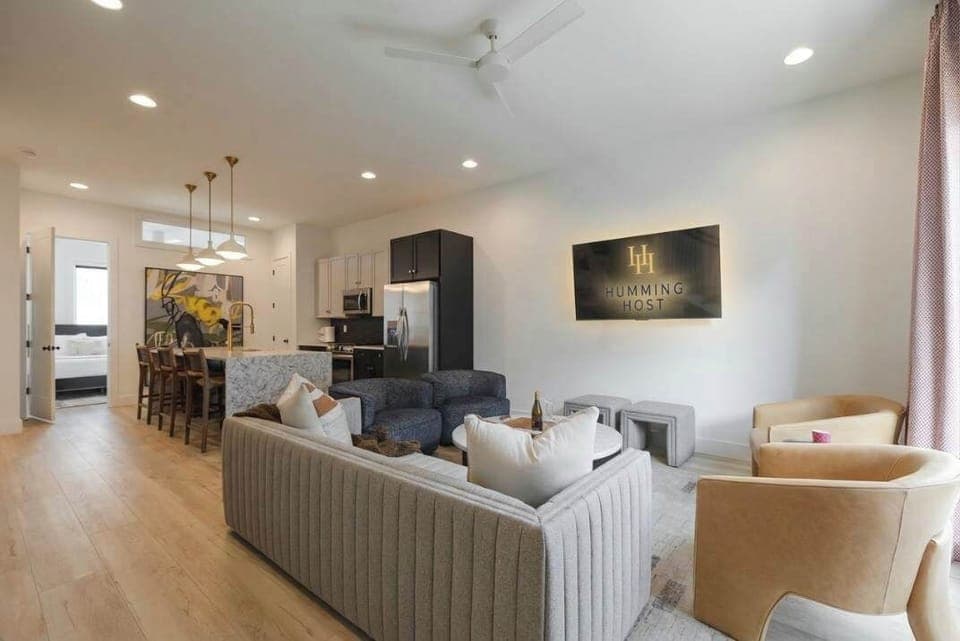Spacious and comfy living room located on the 2nd floor along with the primary bedroom and bathroom, and the luxury open kitchen. 