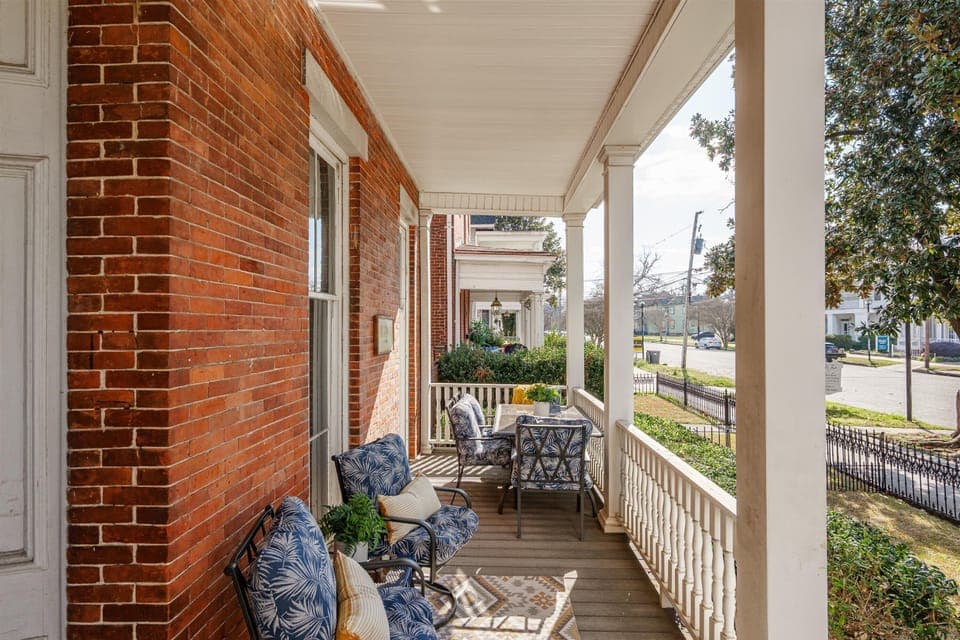 shared space covered patio with outdoor seating