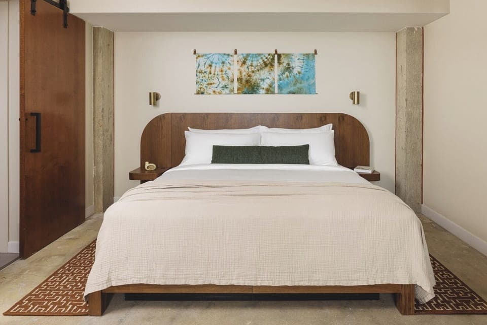 Sink into crisp bedding for a quiet, restorative night.