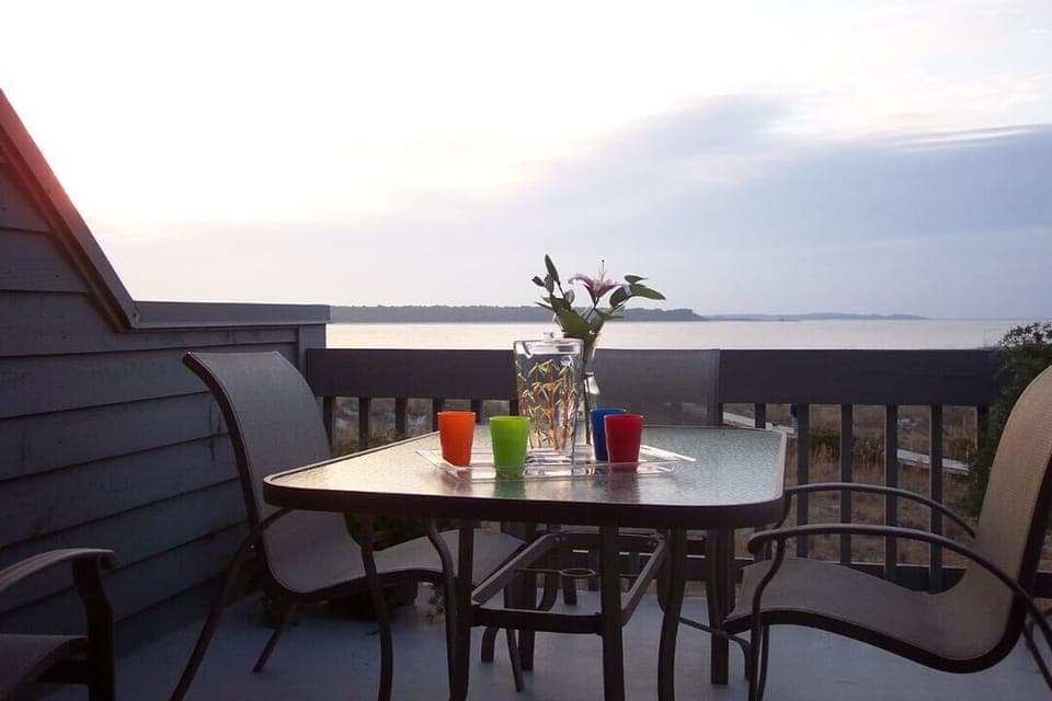Enjoy a romantic cocktail or dinner while watching the water and sunset.