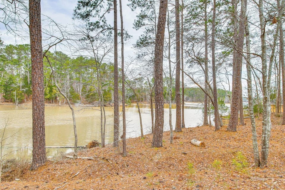 Townhome Exterior | Lake Views & Access | Canoe
