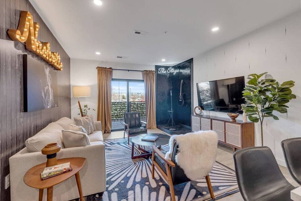The Stage Living room with luxury furnishings and queen sleeper sofa