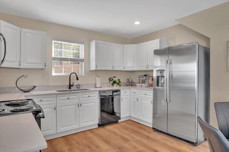 Modern appliances,
cookware, and coffee
maker included.