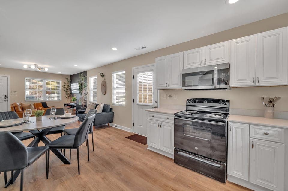 Fully equipped kitchen
with modern
appliances, cookware,
coffee maker, and
everything needed for
home cooked meals