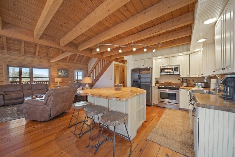 Kitchen features Center Island with Bar Stool Seating for Three