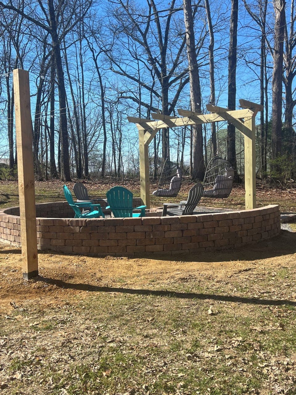 Beautiful outdoor firepit with lights for enjoying after dark.