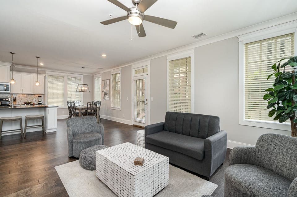 Unit 1: Open and inviting living space featuring a Smart TV and cozy furnishings.