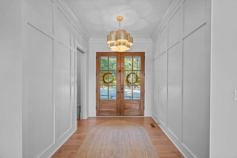 Foyer with natural light from all the windows.