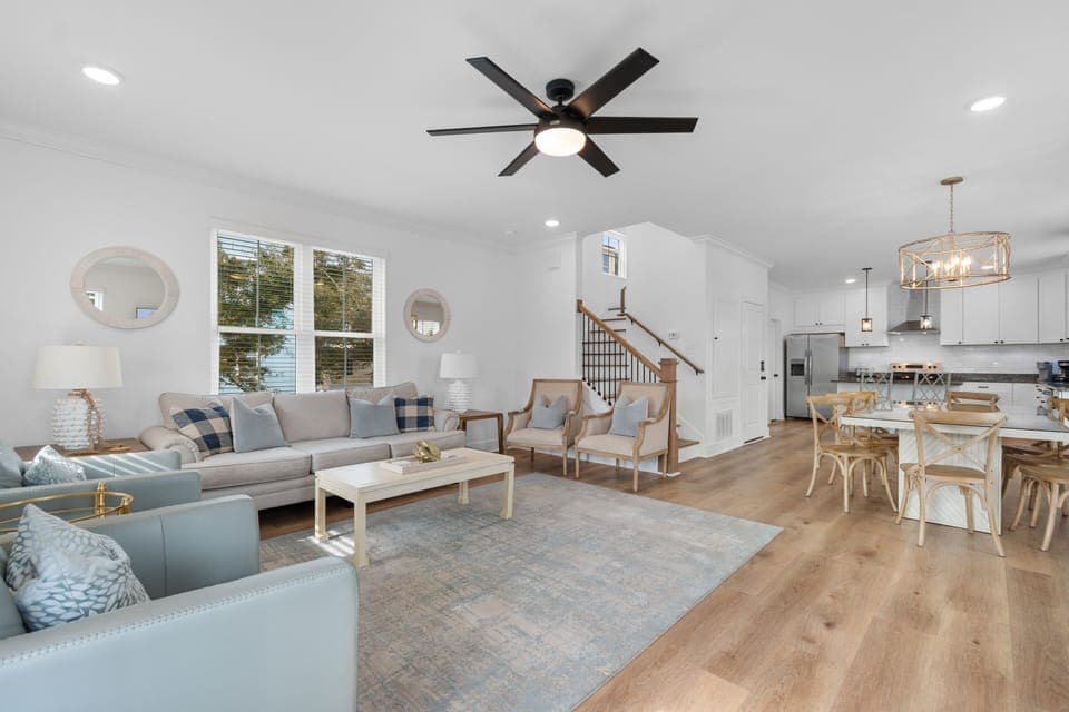 Unwind in this bright open living space where coastal comfort meets modern style, perfect for gathering with your group.