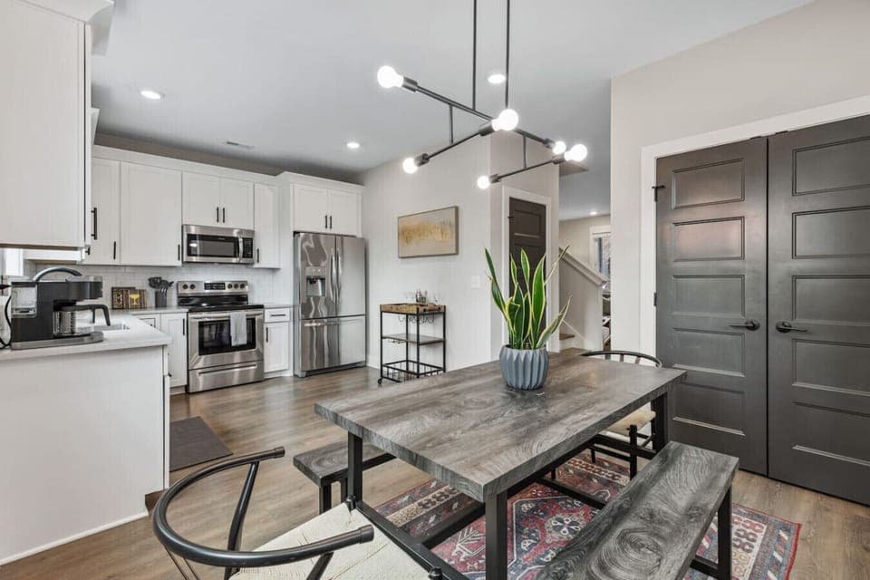 Spacious & bright dining room with seating for six around the table off the kitchen. Enjoy a meal or carry-out from one of the many East Nashville local eateries.