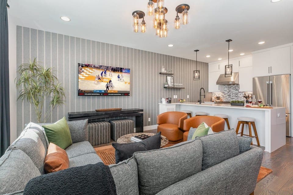 2nd Floor: Open-floor living space featuring a Smart TV and designer furnishings.