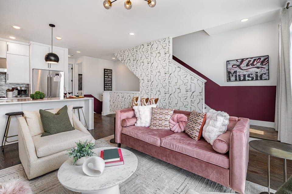 Open-floor living space featuring a smart TV and designer furnishings. (2nd Floor)