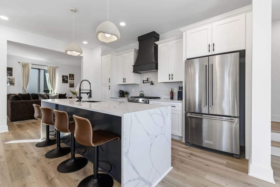 Enjoy your dream getaway in this chic kitchen, perfect for entertaining! With luxurious finishes and a seamless flow to the cozy living area, this Nashville rental is ideal for family reunions or bachelorette parties. Cook gourmet meals while soaking up the Music City vibe!