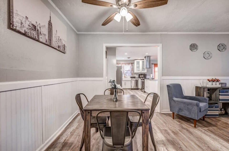 Dining area with table and four chairs