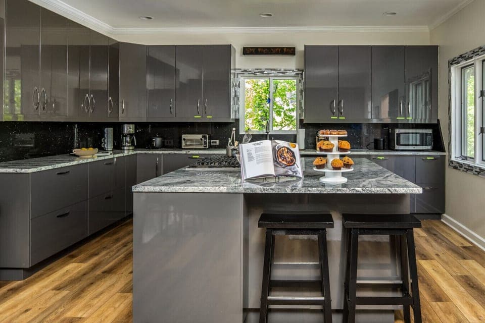 Kitchen l Fully Equipped with Island Seating (Pastries not included)
