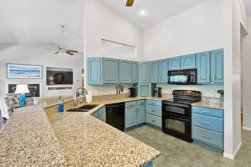 Enjoy the spacious kitchen—perfect for cooking all your meals and gathering together to share stories and laughter.