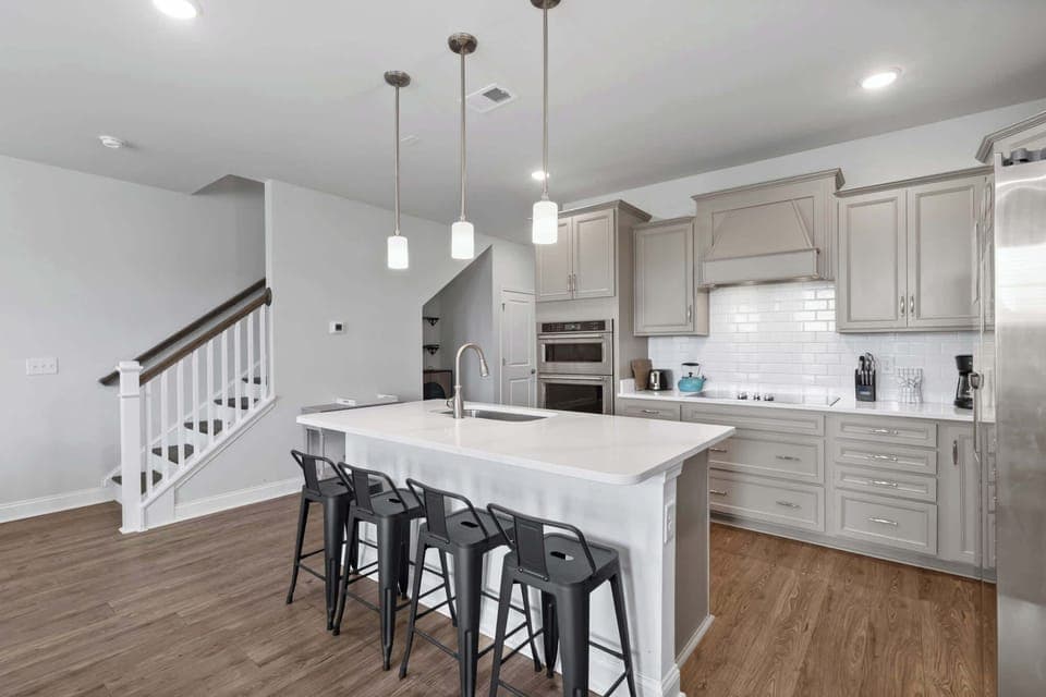 Kitchen with island seating for four