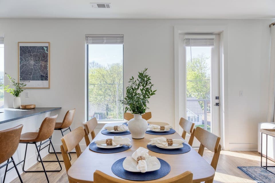 Gather around this modern table for shared meals or a quiet workspace.