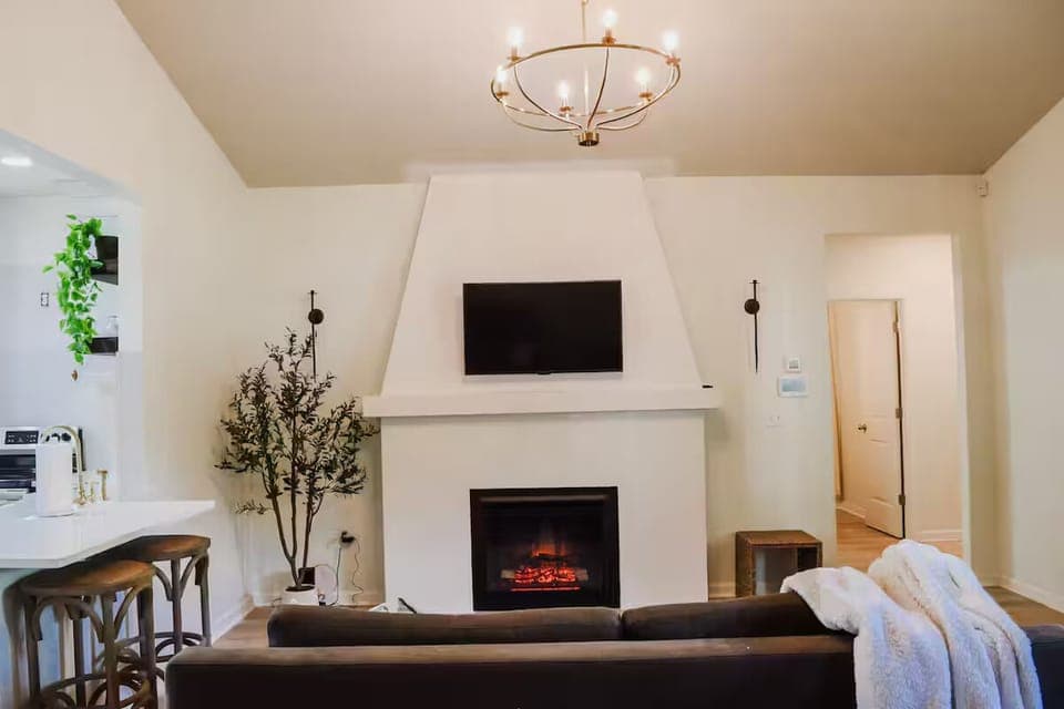 Custom built fireplace and smart TV with streaming services 
