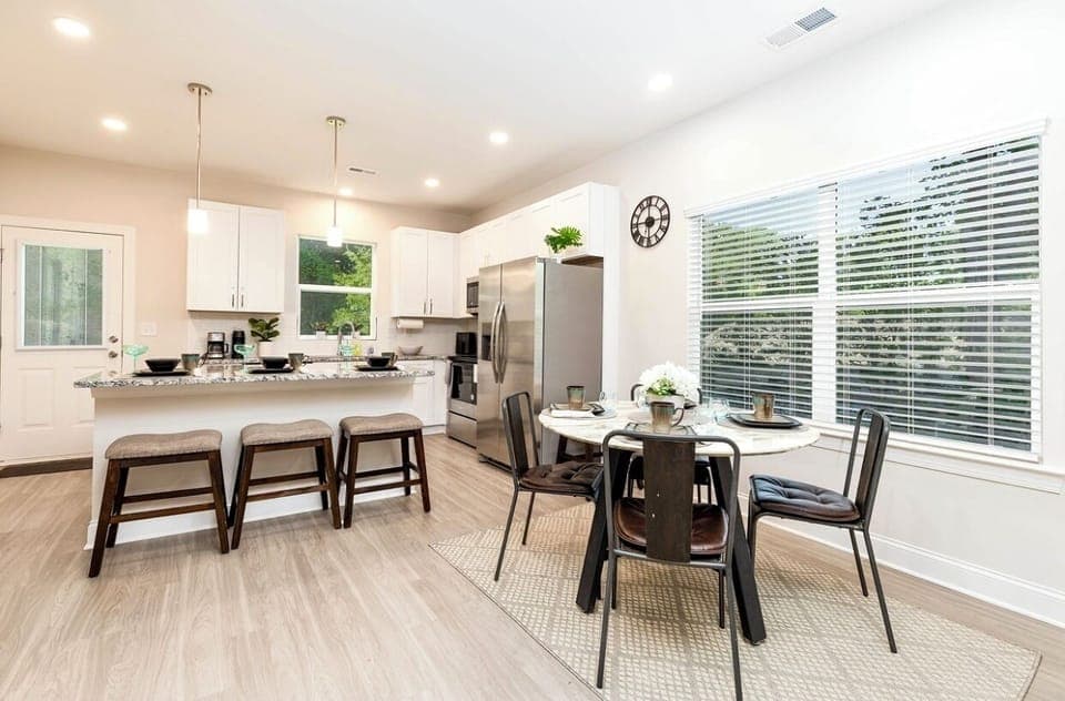 Dining table with 4 chairs, and 4 chairs to seat at island table
