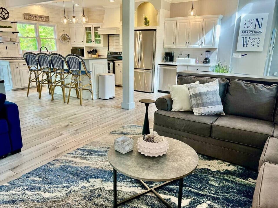 A spacious open family room, kitchen and dining area welcome you as you walk in the front door.