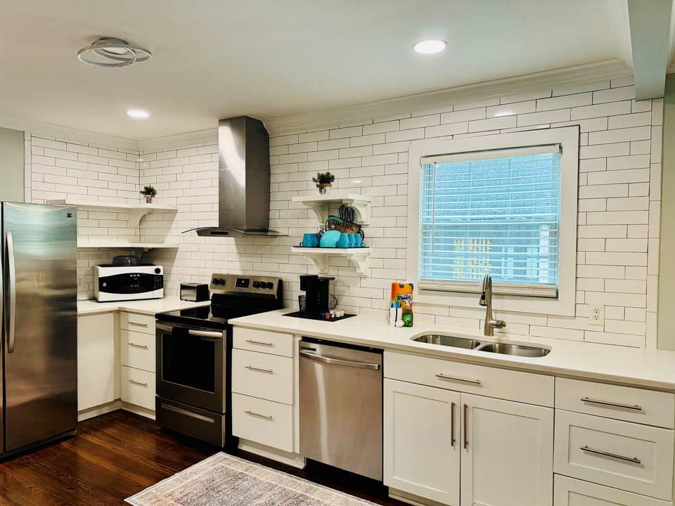 Ample and fully stocked kitchen.