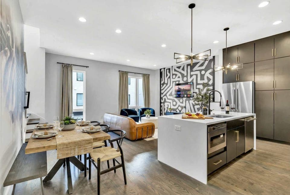 Explore this stylish Nashville retreat, perfect for groups or bachelorette parties! Enjoy a premium kitchen, cozy living area, and dining table for memorable meals, all just steps from Music City's nightlife. Your ideal getaway awaits!