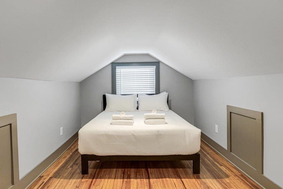 3rd bedroom featuring a Queen bed and lounge area.