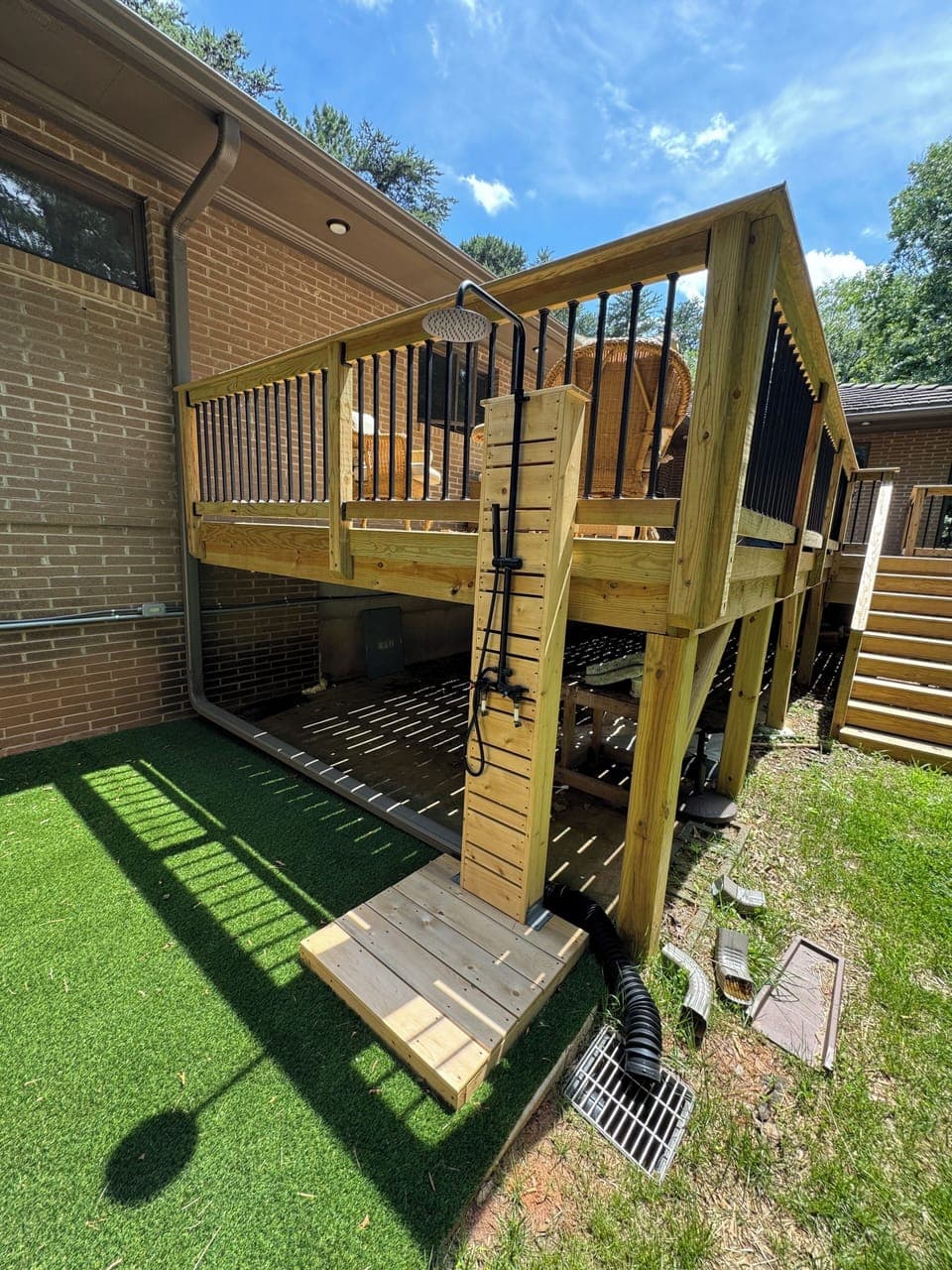 Outdoor shower off the deck and by the Sauna