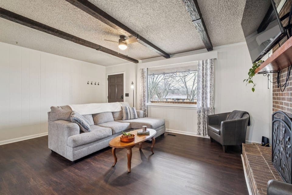 Living room with large bright front window