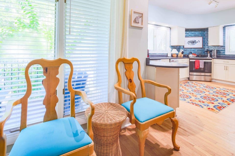 There are two additional chairs that can be used at the table.