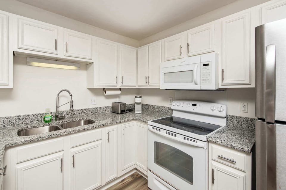 3 Kitchens - Whip up breakfast with ease in this bright and modern Myrtle Beach kitchen.

