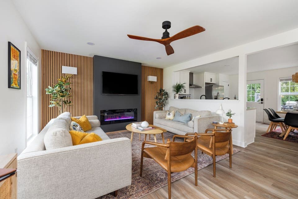 Relax in our living room by the fire while enjoying a TV show.