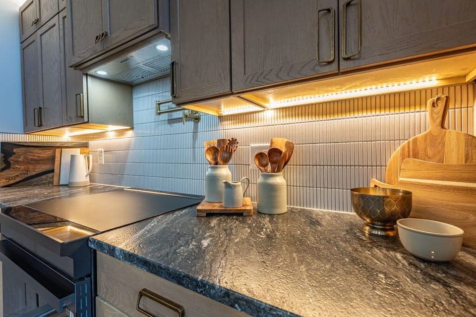 Our fully stocked kitchen features high-end appliances and ample cooking space—perfect for preparing delicious meals and enjoying quality time together. 